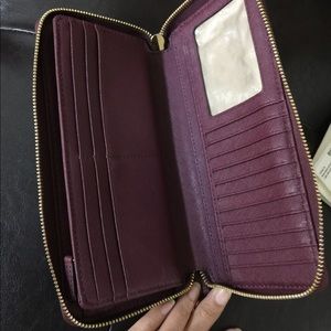 Original Michale Kors plum color wallet